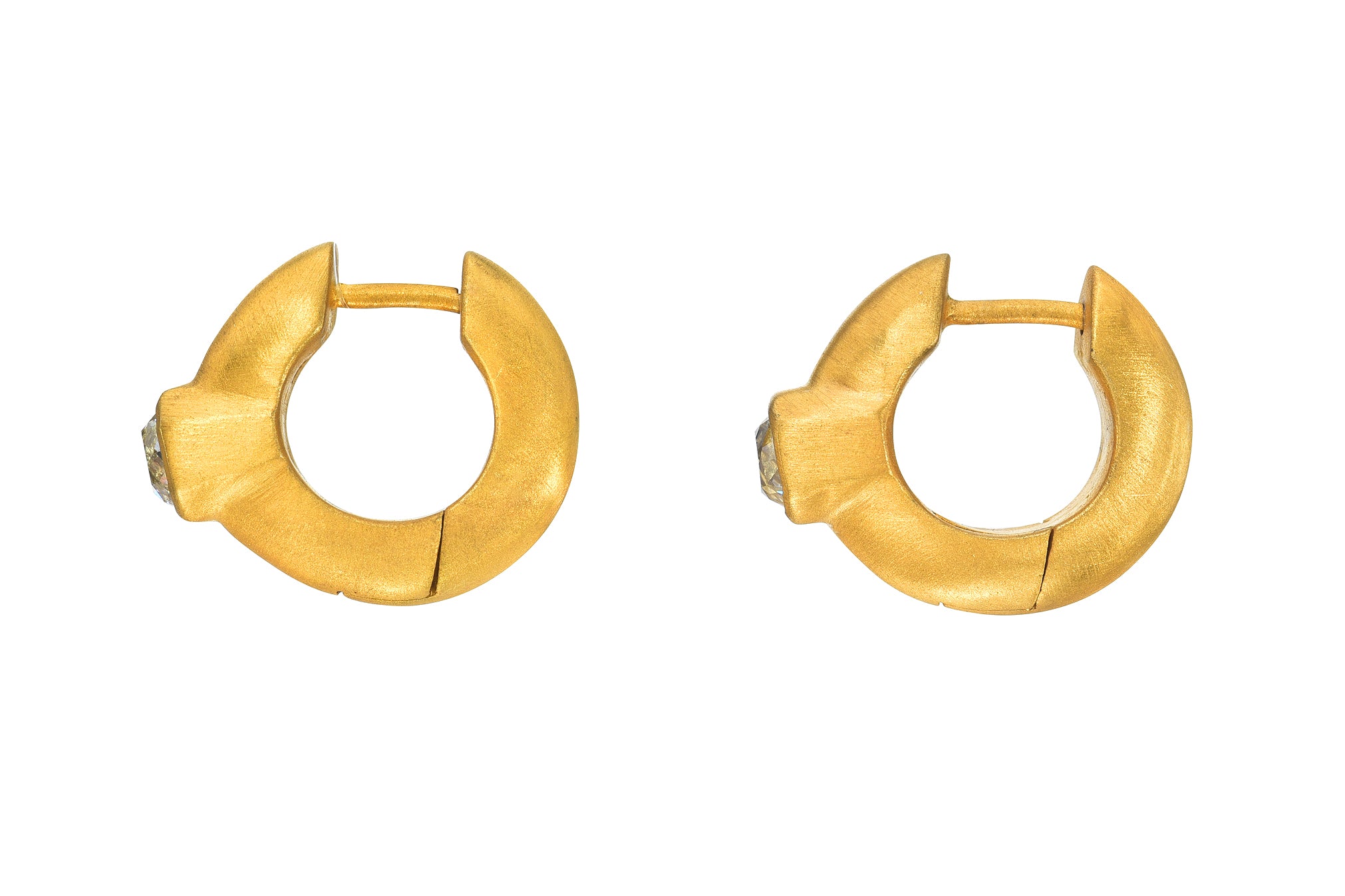 DARIUS JEWELS.Pair of Signature Hoops featuring 0.88 cts Antique Old Mine Cut Diamond bezel set in 18K Fairmined Yellow Gold.